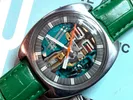 A watch with some parts missing on it