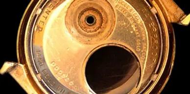 A close up of the bottom of an oil tank.