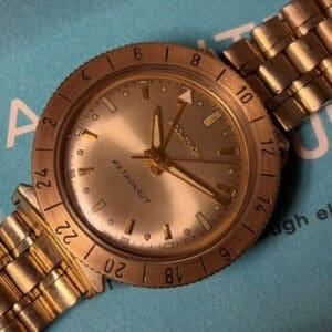 Solid 14k Bezel Accutron Astronaut with Champion Bullet Braclet