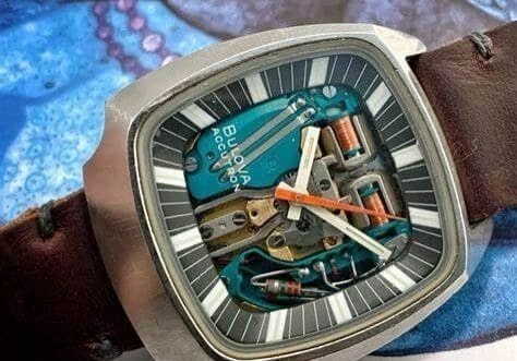 rs=w_1280 (16) Bulova Accutron wristwatch with brown band.